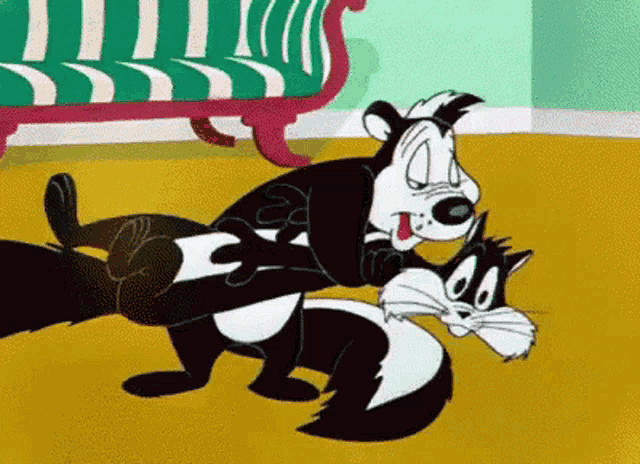 a cartoon of a cat and a skunk fighting each other