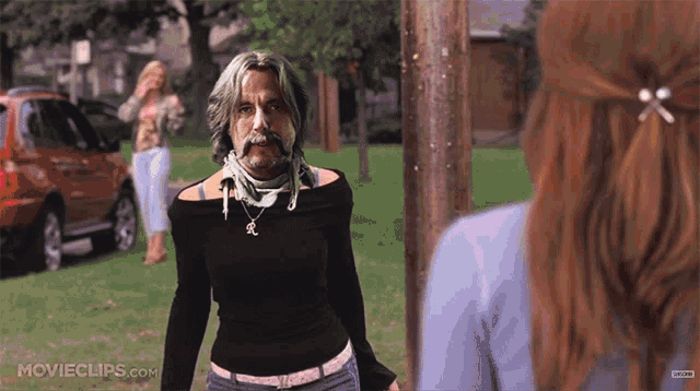 a movie clip from movieclips.com shows a woman talking to a man