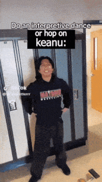 a man standing in front of lockers with the caption do an interpretive dance or hop on keanu :