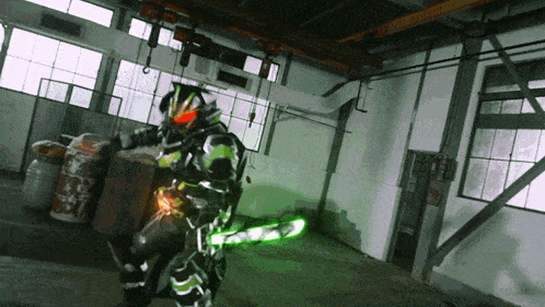 a person with a green sword is standing in a dark room