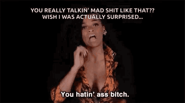 a woman is talking on a cell phone and saying `` you really talkin mad shit like that ? ''