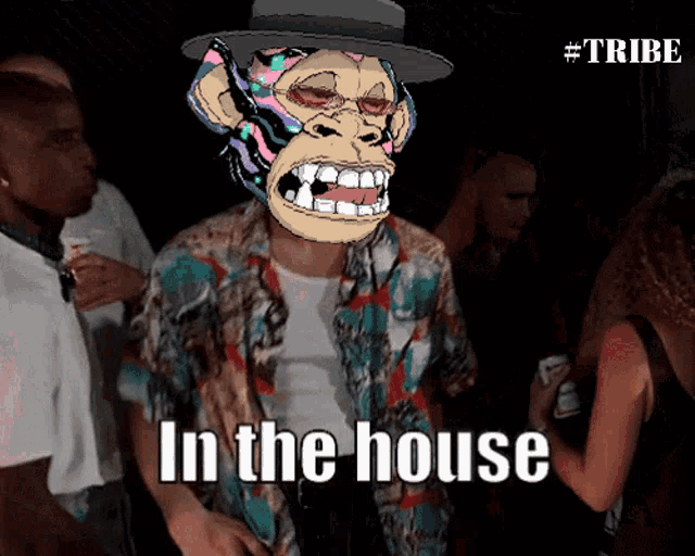 a picture of a man with a monkey on his head and the words in the house below him