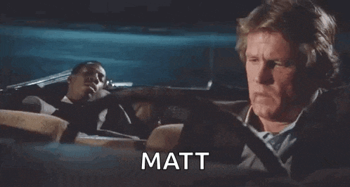a man is sitting in a car with the words tell me a story matt