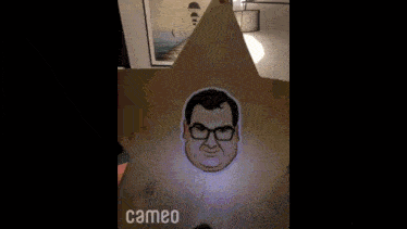 a cameo video of a person playing with a stuffed animal in a living room