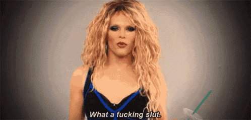 a drag queen is saying what a fucking slut .