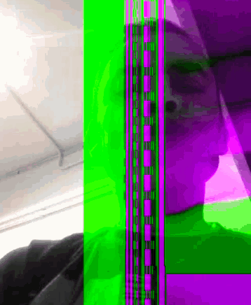 a green and purple image of a person 's face with a purple border