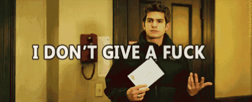 a man holding a piece of paper with the words i don t give a fuck above him