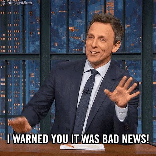 a man in a suit and tie is saying that he warned you it was bad news