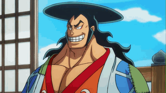 a cartoon character wearing a hat and a kimono is smiling