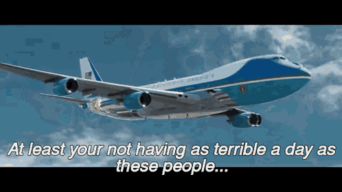 a plane is flying in the sky with the words at least your not having as terrible a day as these people below it