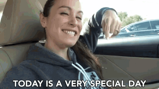 a woman in a car with the words today is a very special day on the bottom