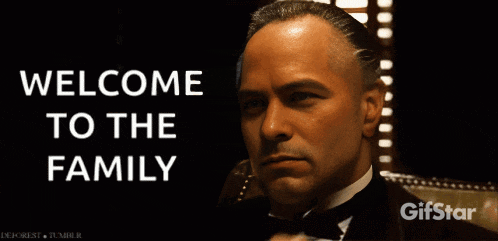 a man in a tuxedo with the words welcome to the family on the bottom