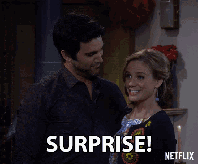 a man and a woman are standing next to each other and the woman says surprise netflix