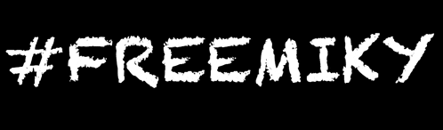 a black background with the words #freemiky written in white