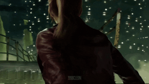 a woman in a red leather jacket is standing in a dark room with the year 1980 on the bottom left