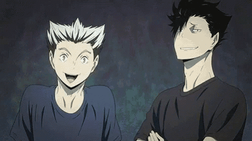 a couple of anime characters are standing next to each other and smiling .