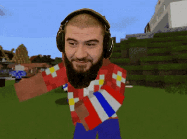 a man wearing headphones and a red white and blue shirt