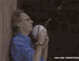 a blurred image of a woman sitting on a ball with the words coollana productions on the bottom right