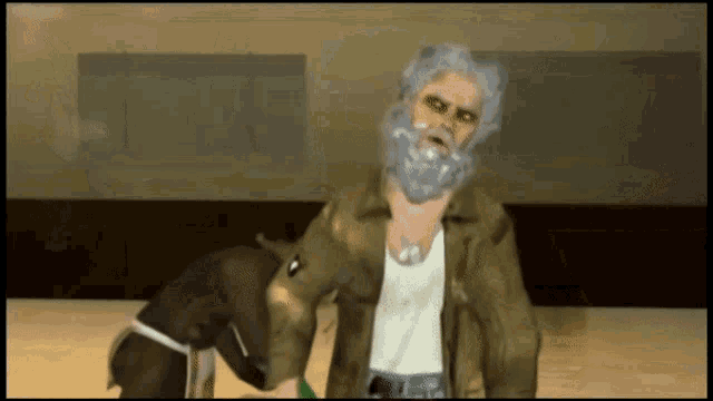 a man with a beard is standing next to a woman and a dog