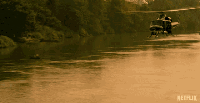 a helicopter is flying over a body of water with the netflix logo in the corner