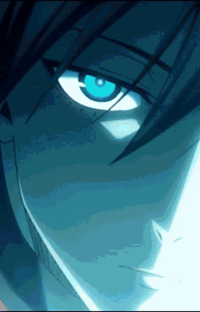 a close up of a man 's face with blue eyes