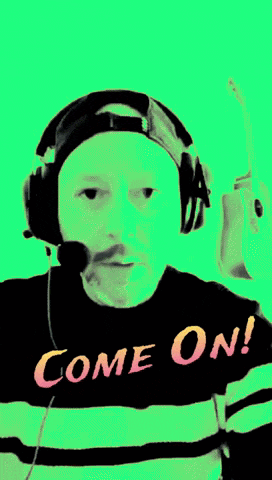 a man wearing headphones and a shirt that says come on on it