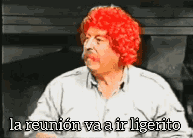 a man with red hair and a white shirt says la reunion
