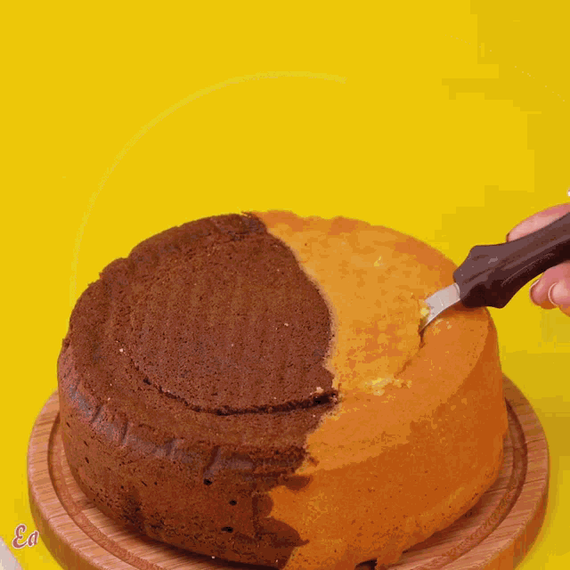 a person is cutting a cake with the word easy on the bottom right corner