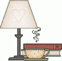 a lamp with a heart on the shade is next to a cup of coffee and books
