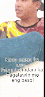 a man in a hat is holding a blue pillow and the words kung nasaan ka man magparamdam ka paglawin mo ang baso