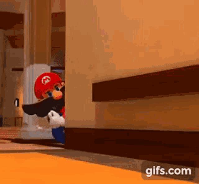 a cartoon character is peeking out from behind a wall .