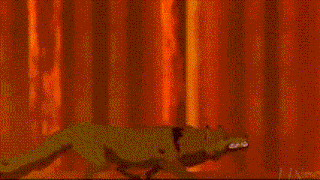 a silhouette of two people dancing in front of a curtain