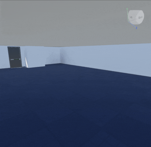 an empty room with a blue tile floor