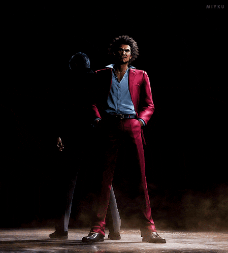 a man in a red suit is standing in a dark room with the name miyku on the bottom