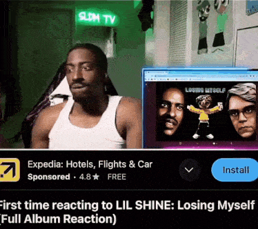 an ad for lil shine shows a man in front of a computer screen