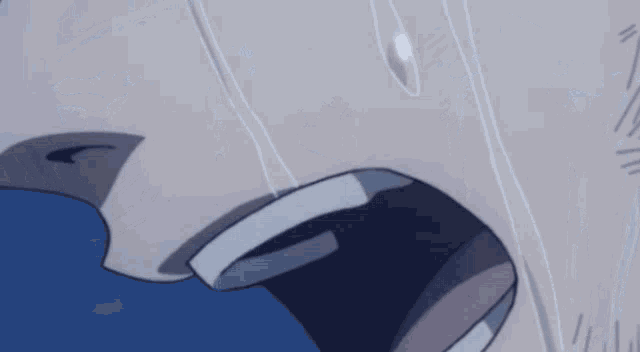 a close up of a person 's face with tears running down their face