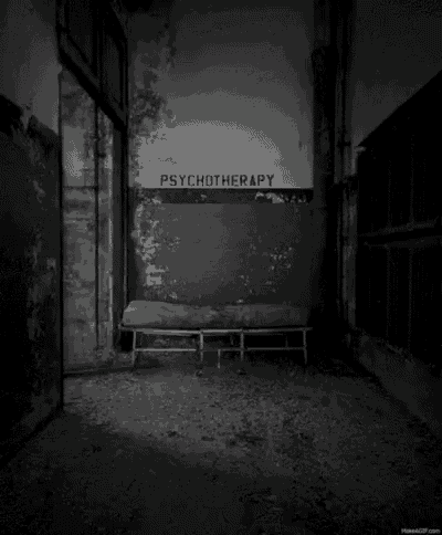 a black and white photo of a room with the words psychotherapy on the wall