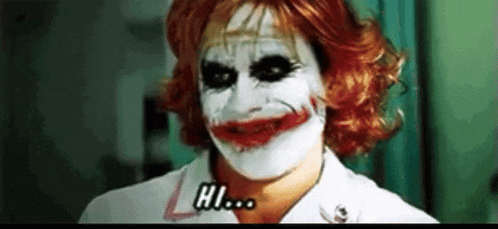a close up of a person wearing a joker costume and a nurse 's uniform .