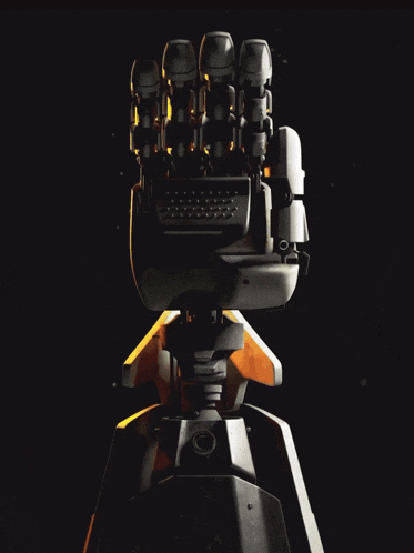 a close up of a robotic hand with a black background