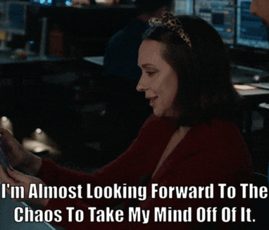 a woman wearing cat ears says i 'm almost looking forward to the chaos