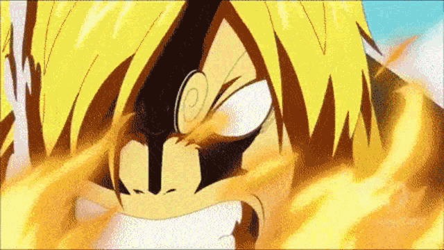 a close up of a person 's face with fire coming out of his eyes .