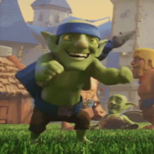 a green goblin with a blue headband on his head is standing in the grass