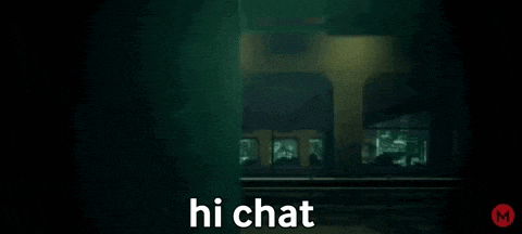 a person standing in front of a building with the words hi chat written on the screen