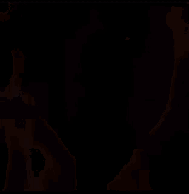 a blurry image of a person 's face with a blurred background