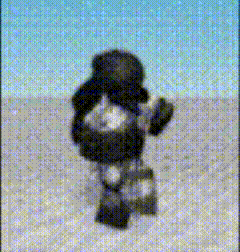a blurry picture of a person standing in the sand
