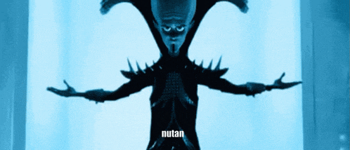 a picture of a monster with the words " nutan nuan ki " on the bottom