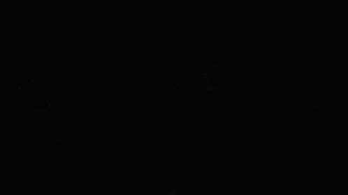 a bunch of circles are floating in the dark