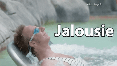 a man is laying in a hot tub with the word jalousie written above him