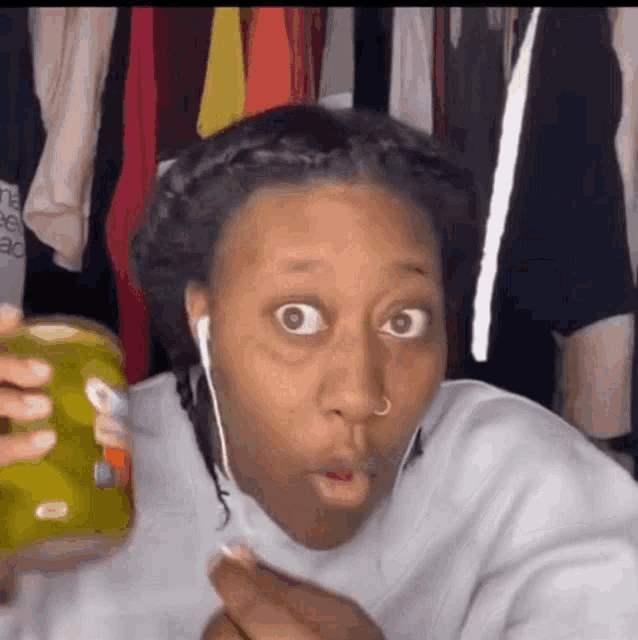 a woman with a surprised look on her face