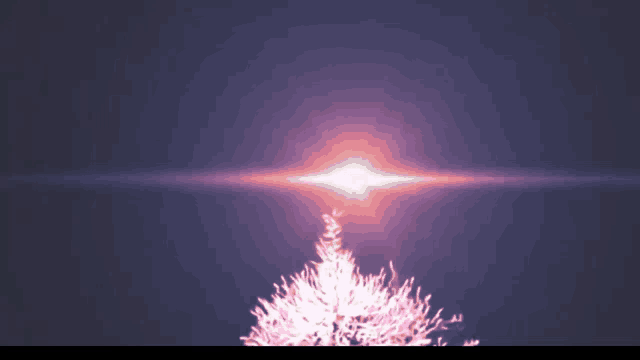 a christmas tree with pink flowers against a dark sky